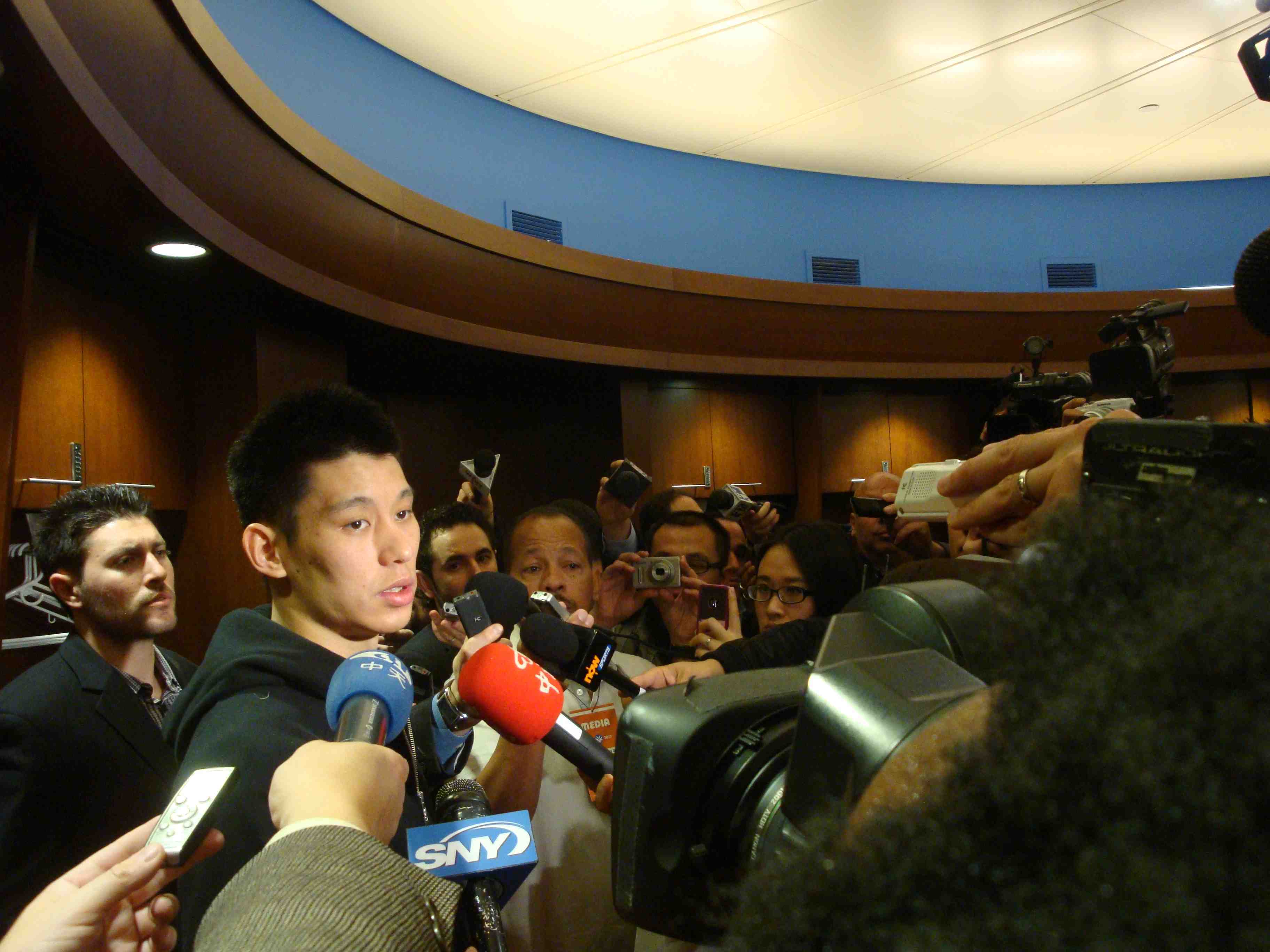 thumbnail-jeremy lin in the locker room faces press 295kb- photo by suzanne joe kai