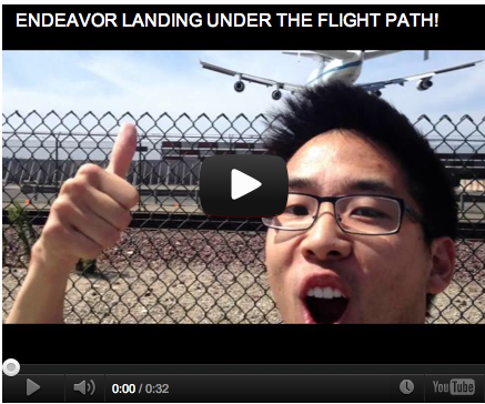Mike Kai watches right under the flight path as Space shuttle Endeavour arrive at LAX